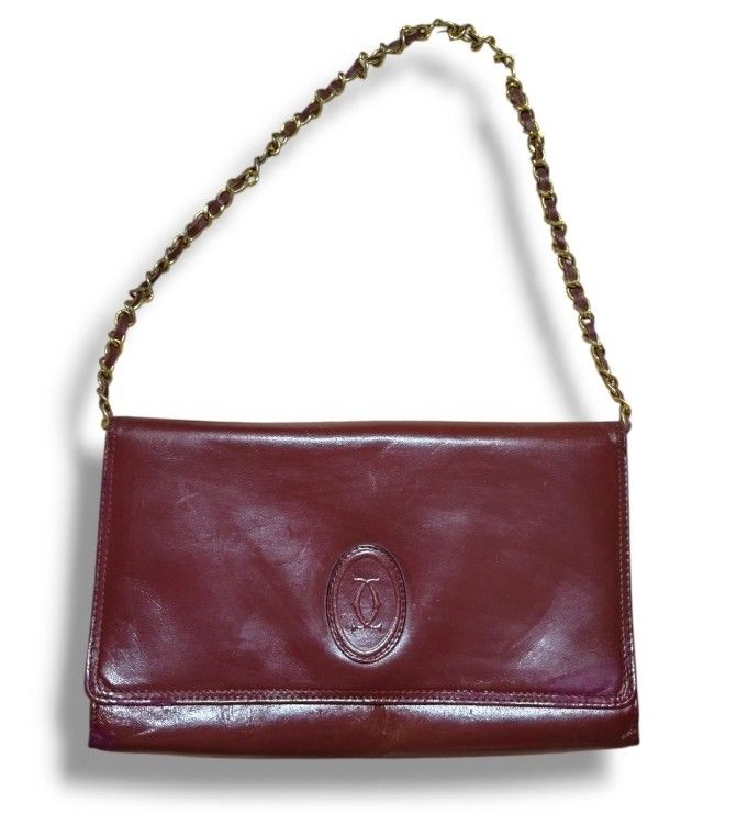 Cartier leather two-way bag (Category: Luxury Bags & Wallets) located in Donsol. Submitted by saksthriftavenuebyluckymaria8 (Listing ID 1385970496, Image 1). Description: made in France lampo zipper 10 3/4 in x 6 3/4in 11in handle drop excellent used condition.
