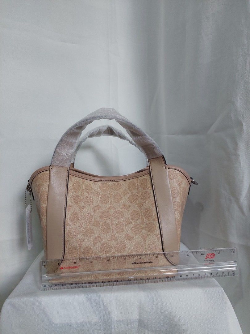 CCH Hadley 21 in Sand Taupe (Category: Cross-body Bags) located in Davao. Submitted by declutteeeeeeer (Listing ID 1385841378, Image 1). Description: Rfs: Impulse buying (too many bags na).