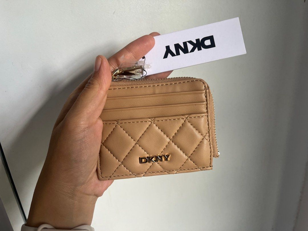DKNY (Original) (Category: Luxury Bags & Wallets) located in Mangaldan. Submitted by ali.knox19 (Listing ID 1385844033, Image 1). Description: original price 48 USD (Php 2700).