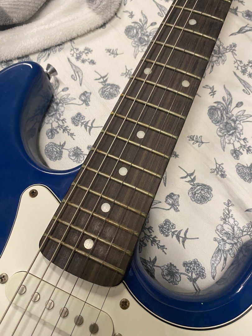 Electric Guitar (Category: Musical Instruments) located in Mandaluyong City. Submitted by g.prelovedtingz (Listing ID 1385949778, Image 3). Description: RJ Terracaster Electric guitar in Navy Blue - bought in 2018ish in RJ Guitar Megamall for around 7k brand new - my personal guitar in high school - barely used only at home filming covers - strings are still the original ones (very rusty needs to be changed) - comes with padded case - nego for su