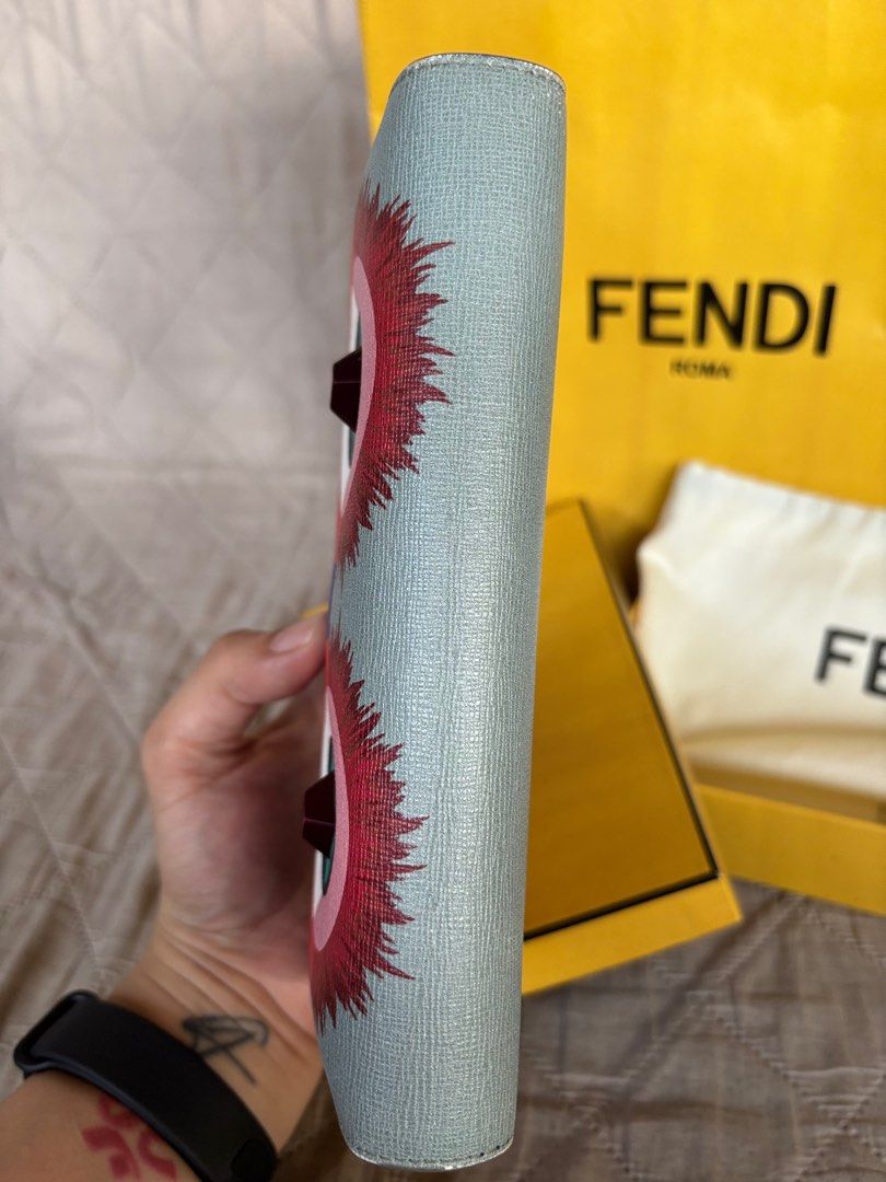Fendi Multicolor Monster Wallet (Category: Luxury Bags & Wallets) located in Marikina City. Submitted by micharon (Listing ID 1385841801, Image 2). Description: Guaranteed authentic, bought in the US Signs of use, more photos will be sent upon request as I cant upload all of them on the listing Slightly negotiable *this is a used item, please manage your expectations Includes Original Dustbag, Branded Box, Paperbag Exterior Material: Leather Leng