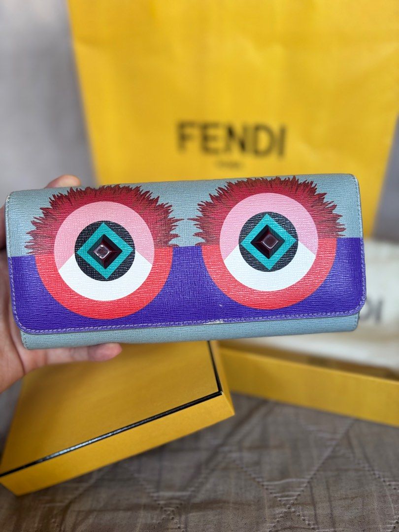 Fendi Multicolor Monster Wallet (Category: Luxury Bags & Wallets) located in Marikina City. Submitted by micharon (Listing ID 1385841801, Image 1). Description: Guaranteed authentic, bought in the US Signs of use, more photos will be sent upon request as I cant upload all of them on the listing Slightly negotiable *this is a used item, please manage your expectations Includes Original Dustbag, Branded Box, Paperbag Exterior Material: Leather Leng