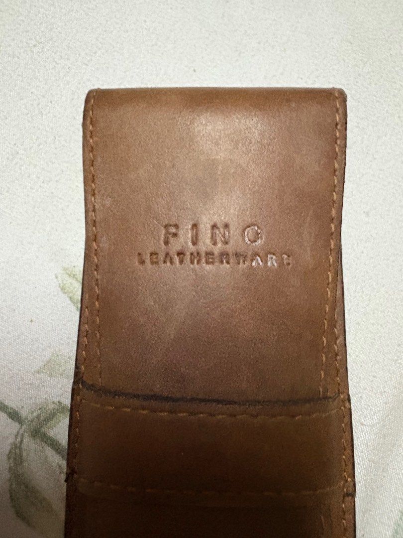 Fino leather pen holder (Category: Luxury Bags & Wallets) located in Paranaque City. Submitted by shopofashopaholic (Listing ID 1385981216, Image 2). Description: Fino leather pen holder Can fit two pens Used but no flaws With box .