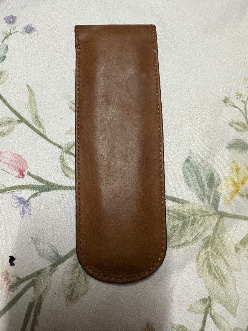 Fino leather pen holder (Category: Luxury Bags & Wallets) located in Paranaque City. Submitted by shopofashopaholic (Listing ID 1385981216, Image 3). Description: Fino leather pen holder Can fit two pens Used but no flaws With box .