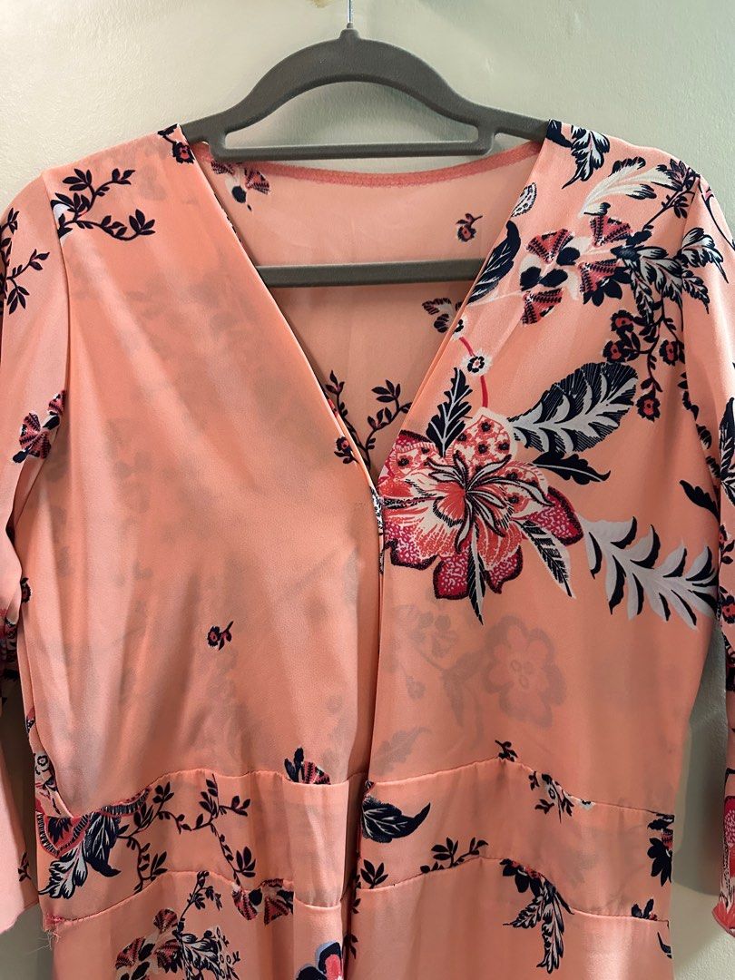 Flowy Floral Wrap Dress (Category: Dresses) located in Marikina City. Submitted by declutteringfatty (Listing ID 1385854480, Image 2). Description: Color: Floral/Pink Size: fits S-M *Used but not abused.