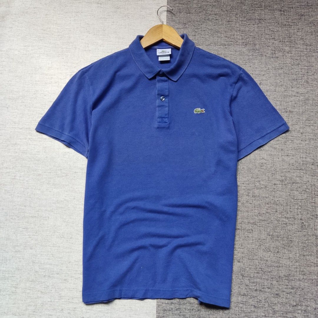 Kaos polo shirt Lacoste Biru colour Size