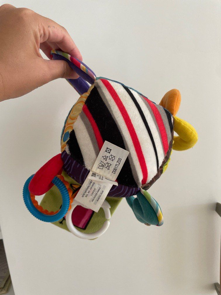 Lamaze Clutch Cube Toy (Category: Infant Playtime) located in Makati City. Submitted by jestangan (Listing ID 1385839513, Image 2). Description: Item wasn’t really used just stored. It will be UV sterilized before shipping out. I can send via LBC. Shipping c/o buyer..