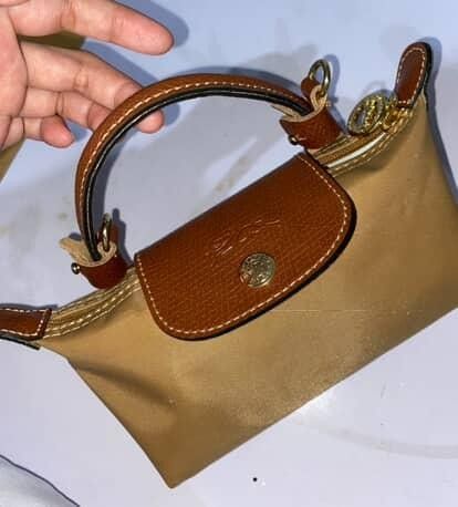 ❤️Negotiable Coach and Longchamp Mini Sling Bag (Bundle) (Category: Luxury Bags & Wallets) located in Pasay City. Submitted by marikn0ws (Listing ID 1385996403, Image 3). Description: Helping a friend:) NEGOTIABLE Longchamp and Coach Mini Sling Bag Bundle Selling both for 4k as a bundle only!! Longchamp - Used, but in very good condition - Bought from Carousel (authentic) - Comes with detachable sling strip - Originally valued at $110 SRP Coach -