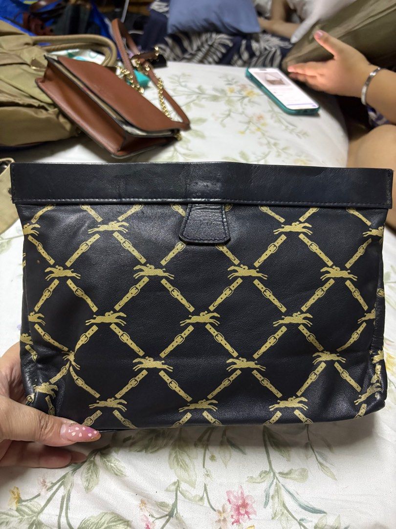 Longchamp clutch (Category: Luxury Bags & Wallets) located in Paranaque City. Submitted by shopofashopaholic (Listing ID 1385988824, Image 2). Description: Authentic and vintage Good condition, no flaws.