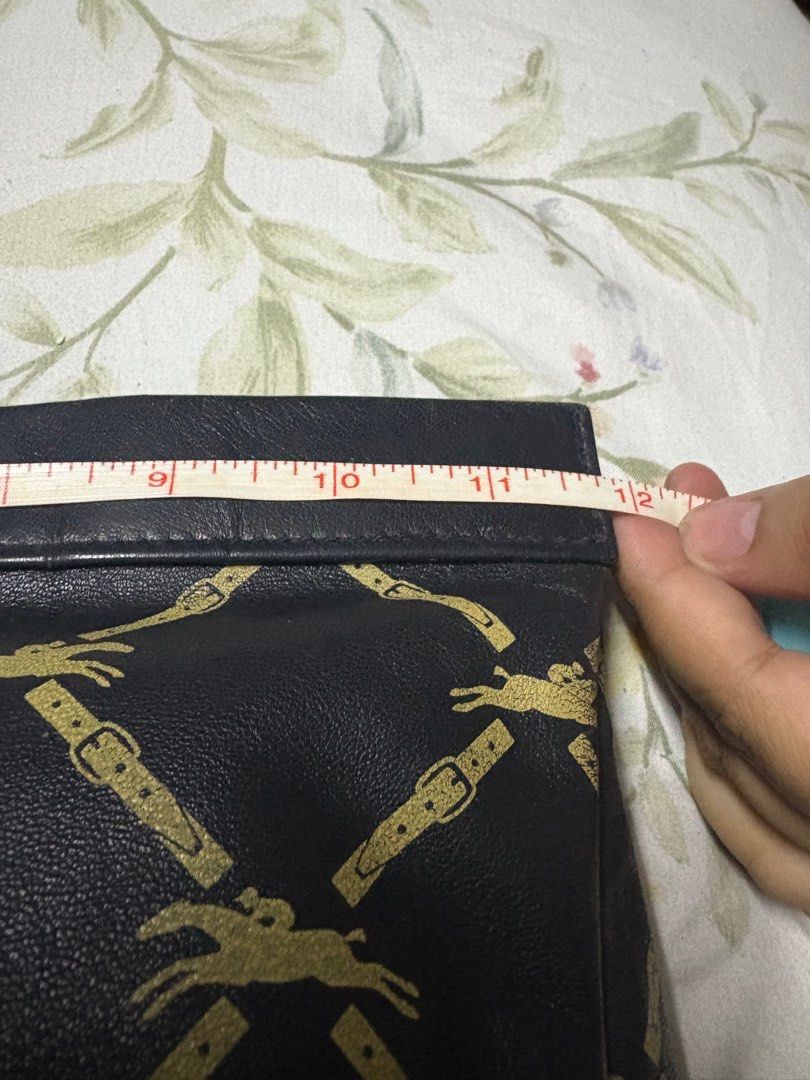 Longchamp clutch (Category: Luxury Bags & Wallets) located in Paranaque City. Submitted by shopofashopaholic (Listing ID 1385988824, Image 3). Description: Authentic and vintage Good condition, no flaws.