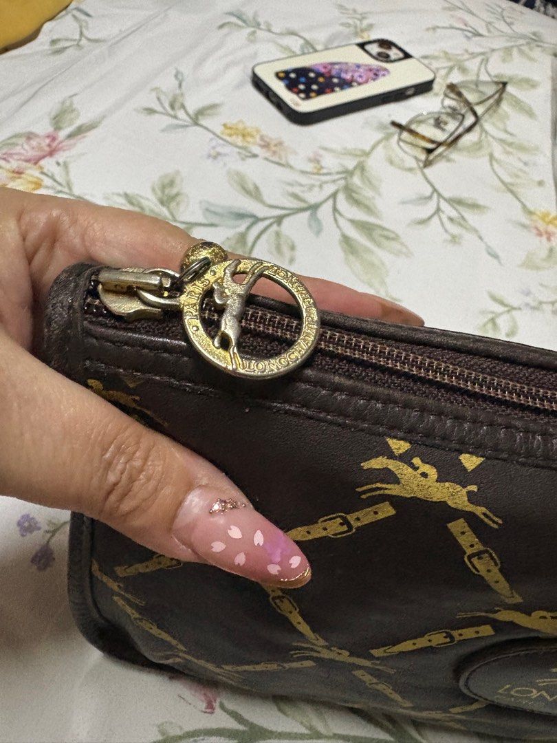 Longchamp leather clutch (Category: Luxury Bags & Wallets) located in Paranaque City. Submitted by shopofashopaholic (Listing ID 1385985721, Image 3). Description: Vintage and authentic Used but great condition Very good leather Length/height: 11 x 6 inches.