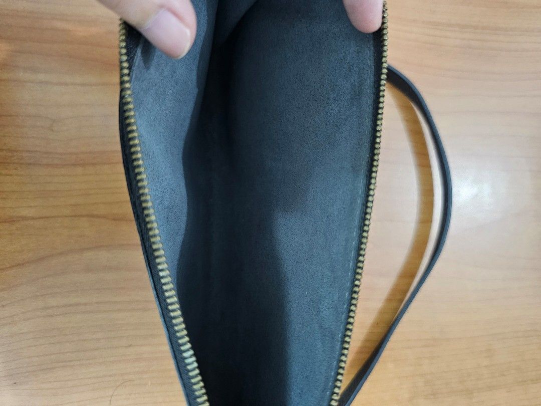 Louis Vuitton epi pochette vintage (Category: Luxury Bags & Wallets) located in Las Pinas. Submitted by vanpru (Listing ID 1385997347, Image 3). Description: Authentic Louis Vuitton epi pochette vintage, seldom used. no inclusions, no original strap,lost it. the strap I used in the picture I just bought online. decluttering.