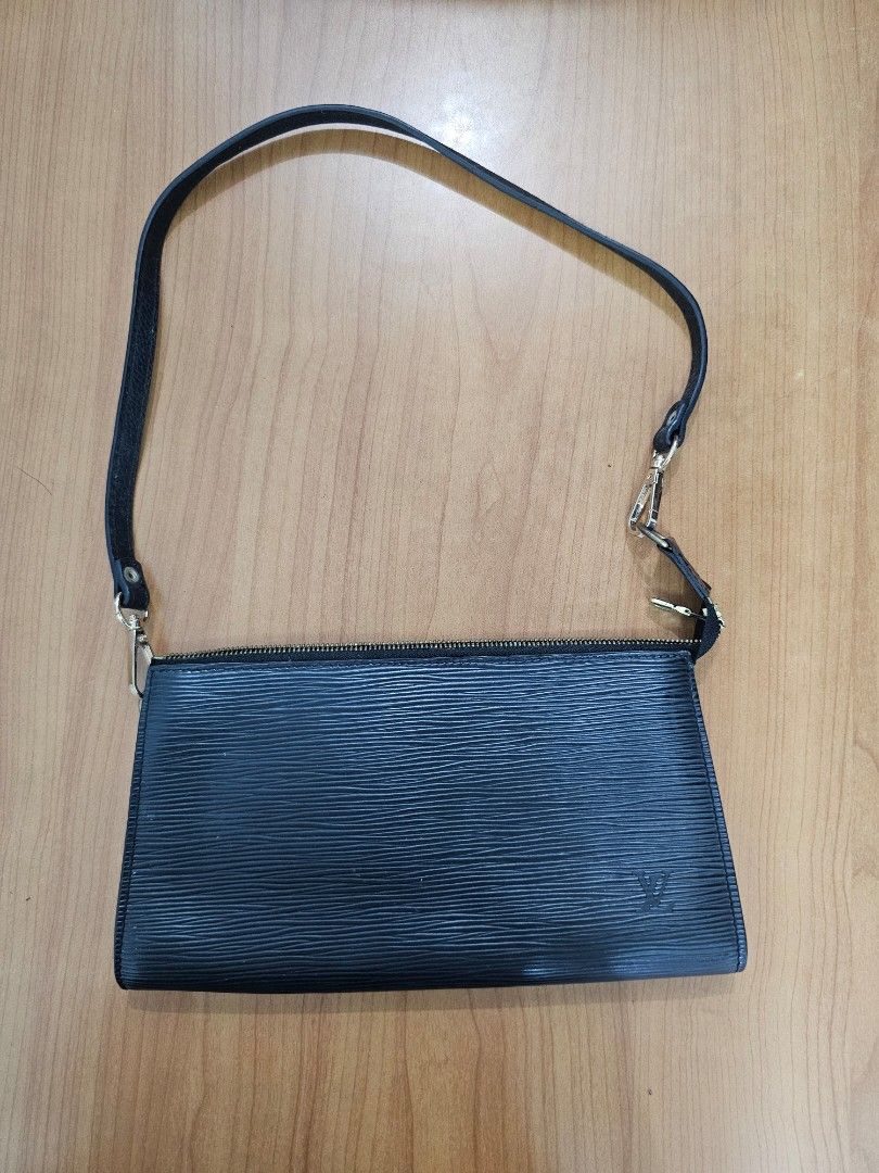 Louis Vuitton epi pochette vintage (Category: Luxury Bags & Wallets) located in Las Pinas. Submitted by vanpru (Listing ID 1385997347, Image 1). Description: Authentic Louis Vuitton epi pochette vintage, seldom used. no inclusions, no original strap,lost it. the strap I used in the picture I just bought online. decluttering.