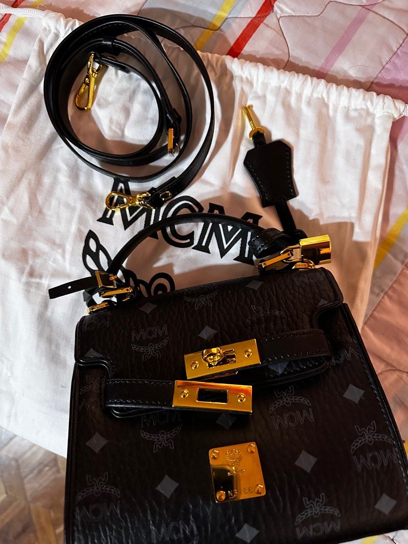 MCM Mini Heritage Satchel (Category: Luxury Bags & Wallets) located in Manila. Submitted by bchrssm (Listing ID 1385880785, Image 1). Description: Inclusions: Dust bag Lock and key Sling.