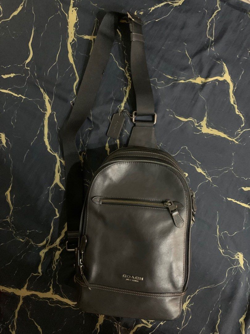 Original Coach Graham Pack Sling for Men - Used (Category: Sling Bags) located in Manila. Submitted by filfer (Listing ID 1385967448, Image 2). Description: Original Coach Graham Pack sling for men - Used Bought for 12k Lightly used and there are signs of usage as seen on photos Selling it for 2,500 - slightly negotiable.