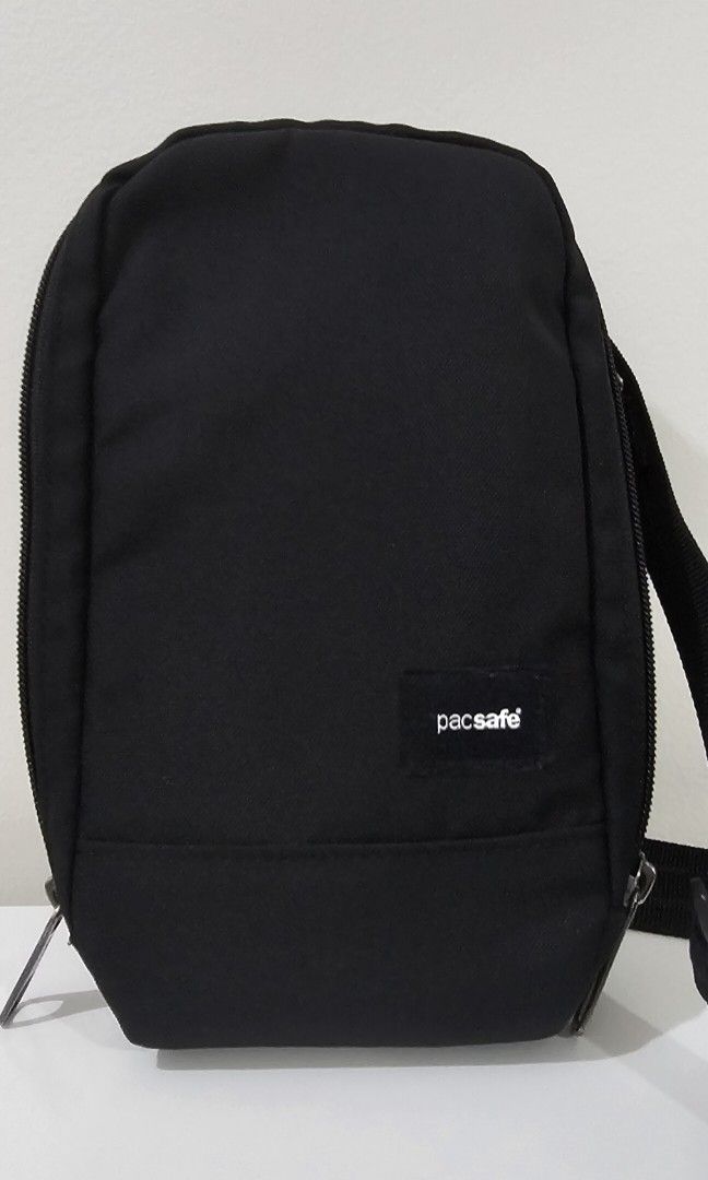 Pacsafe RFIDSafe Tech Crossbody Bag (Category: Sling Bags) located in Pasig City. Submitted by bubbles108 (Listing ID 1385945386, Image 1). Description: Features: *Made from recycled PET for sustainability *Water repellent shell fabric *Fits a folded boarding pass *Organization for your cables and USBs *Passport pocket with RFID blocking to protect your personal details *3 card slots *Internal pockets to keep your gear organized *Internal attachm