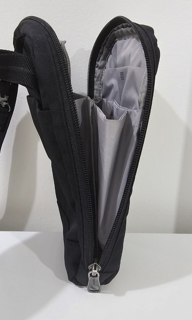 Pacsafe RFIDSafe Tech Crossbody Bag (Category: Sling Bags) located in Pasig City. Submitted by bubbles108 (Listing ID 1385945386, Image 3). Description: Features: *Made from recycled PET for sustainability *Water repellent shell fabric *Fits a folded boarding pass *Organization for your cables and USBs *Passport pocket with RFID blocking to protect your personal details *3 card slots *Internal pockets to keep your gear organized *Internal attachm