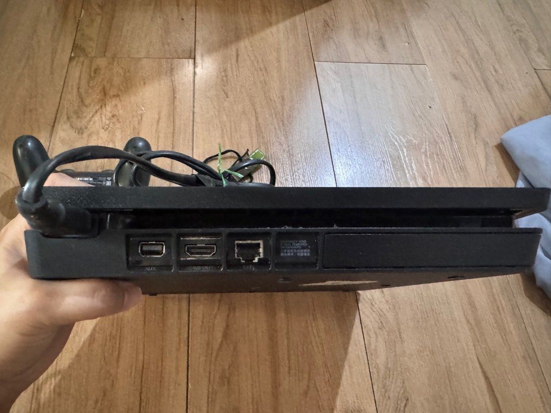 PS4 Slim 1TB Jailbreak (Category: PlayStation) located in Quezon City. Submitted by decluttrqueen (Listing ID 1385820459, Image 3). Description: PS4 Slim 1TB Jailbreak With games and controller Complete cable RFS: Upgraded and no longer used.