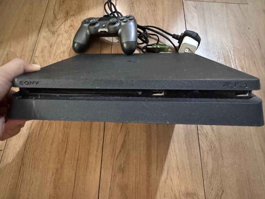 PS4 Slim 1TB Jailbreak (Category: PlayStation) located in Quezon City. Submitted by decluttrqueen (Listing ID 1385820459, Image 2). Description: PS4 Slim 1TB Jailbreak With games and controller Complete cable RFS: Upgraded and no longer used.