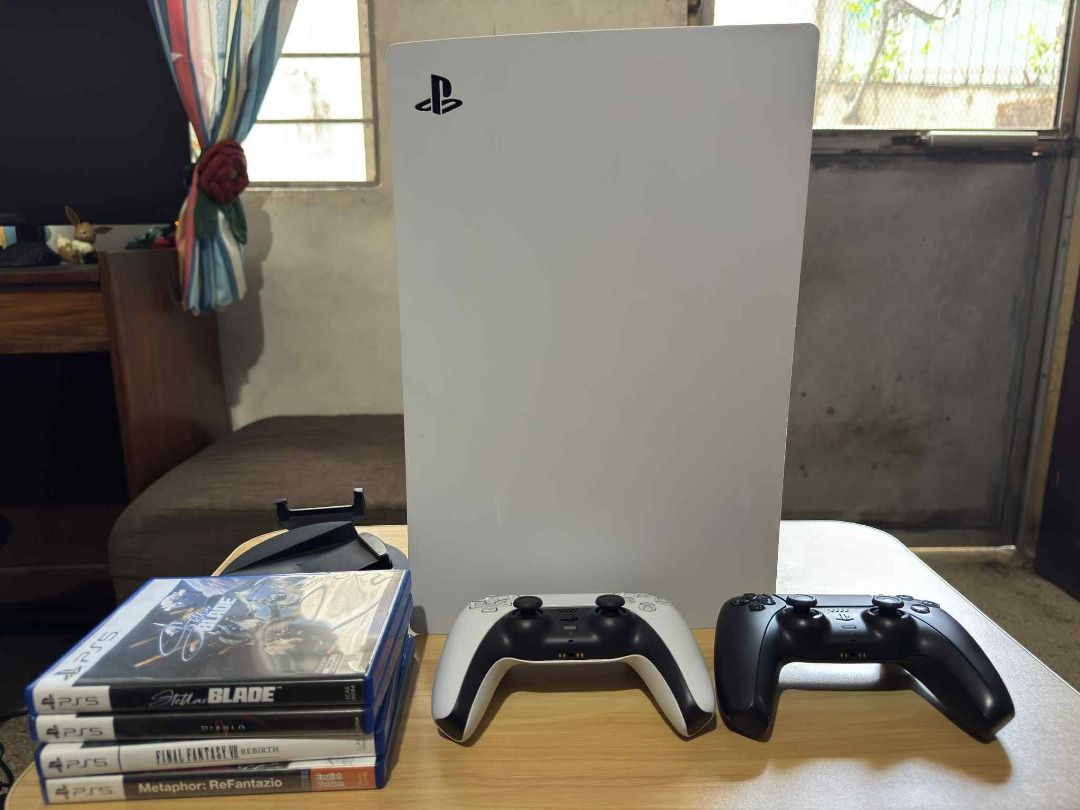 PS5 Fat (Category: PlayStation) located in Quezon City. Submitted by mhirone (Listing ID 1385931691, Image 3). Description: Selling 2nd Hand PS5 Fat (CFI-1218A) For 25k (Slightly Nego) Updated to latest Firmware (Version: 25.05-11.60.00) 100% Working Complete with Box, manuals and receipt of purchase (bought Aug 18, 2023) Inclusions: -PS5 Unit -HDMI Cable -Power Cable -Stand -2 Original DS5 Controllers (White and Black) *White - No Issues *Black 