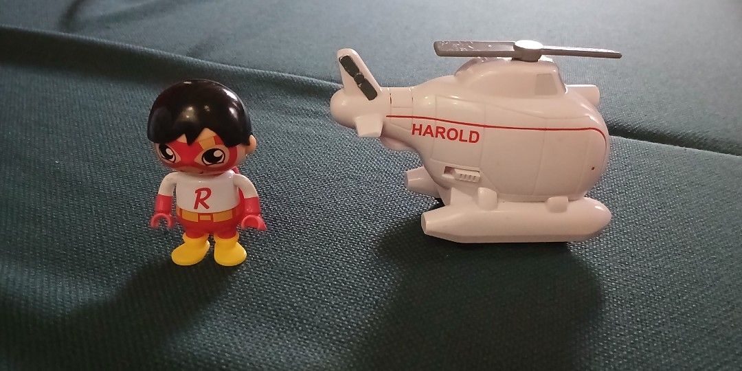 Ryan World figures take both (Category: Figurines & Statues) located in Imus. Submitted by dahdahlicious (Listing ID 1385907726, Image 2). Description: helicopter not included for size reference only from new zealand.