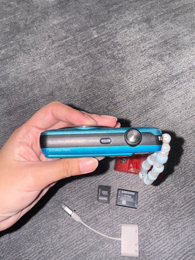 Samsung SL605 Digicam Camera (Category: Cameras) located in Manila. Submitted by bcdeef (Listing ID 1385990567, Image 3). Description: Sample photos are uploaded Needs repair: Ayaw mag-on Inclusions: Battery Charger SD Card SD Card reader to iphone Not negotiable.