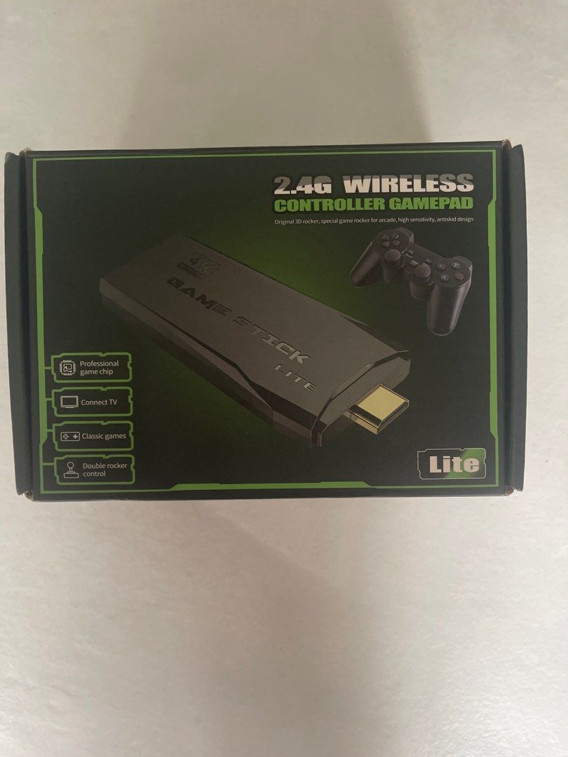 2.4G Wireless Controller Gamepad - Lite (Category: Controllers) located in Singapore. Submitted by javvvy (Listing ID 1386086708, Image 1). Description: - Brand new 2.4G Wireless Controller Gamepad. - Includes game stick, controller, and instructions. - Connects to your TV for retro gaming. - Features double rocker control. - Perfect for retro gaming!.