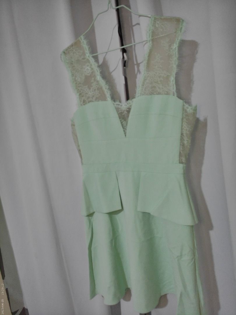 BCBG Mint Green Lace Dress (Category: Dresses) located in Caloocan City. Submitted by khpalawanl92984 (Listing ID 1386087979, Image 3). Description: BCBG Mint Green Lace Dress – ₱4,999 or rent for 999 a day For the European-centric chic who loves timeless elegance — this authentic BCBG mint green dress is perfect for garden parties, weddings, or high-style events. Condition: Excellent, like new Features: Flowing silhouette, premium fabric, flatte