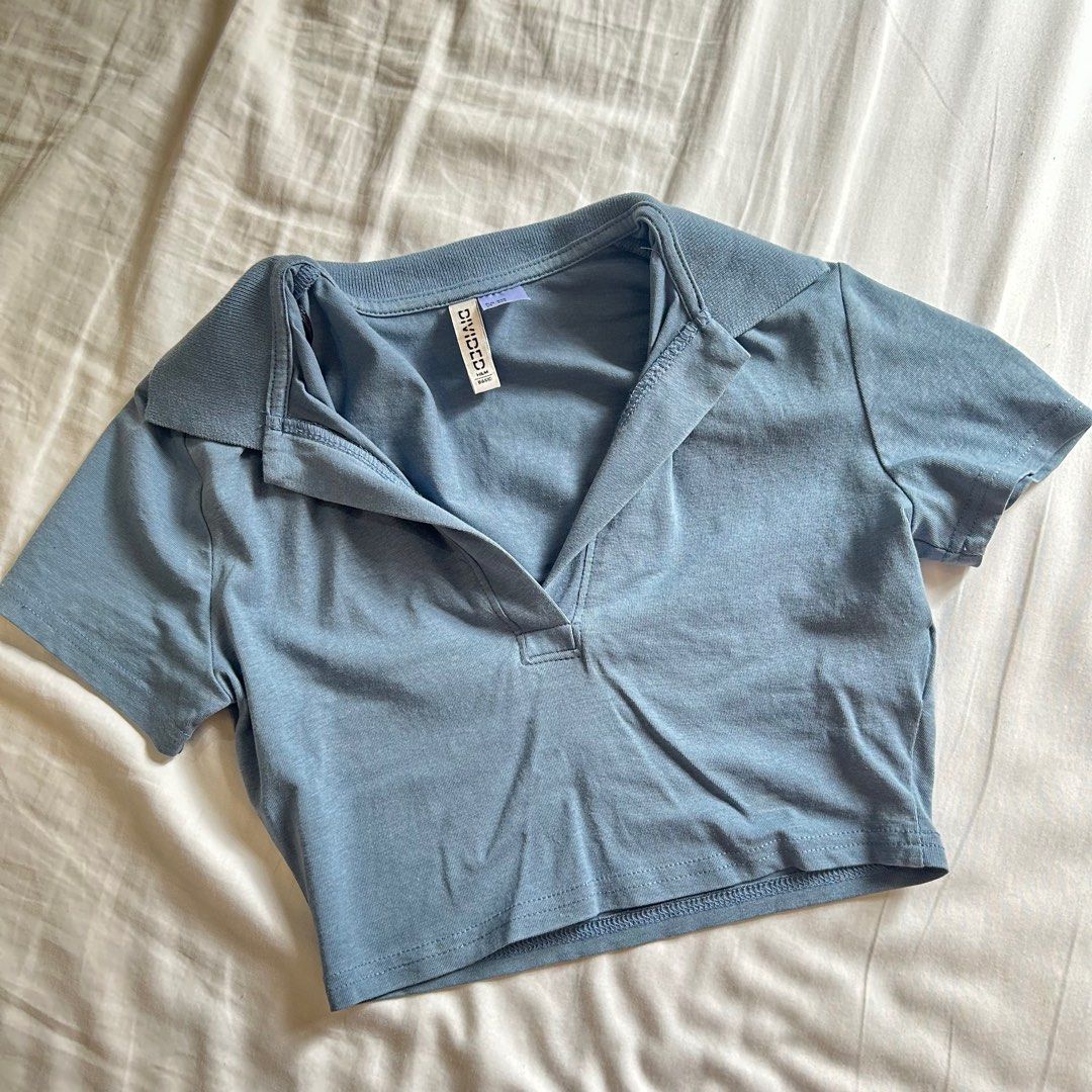Blue collared polo crop top (Category: Others Tops) located in Quezon City. Submitted by usercdam (Listing ID 1386149810, Image 1). Description: RFS: Decluttering Fits XS .