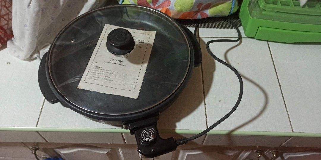 Electric Cooker Pan and Grill (Category: Cookware & Accessories) located in Las Pinas. Submitted by kenespera123 (Listing ID 1386088682, Image 1). Description: Electric Cooker Pan and Grill Price: 2000 pesos Meetup or delivery Contact me for further inquiries. Thank you.