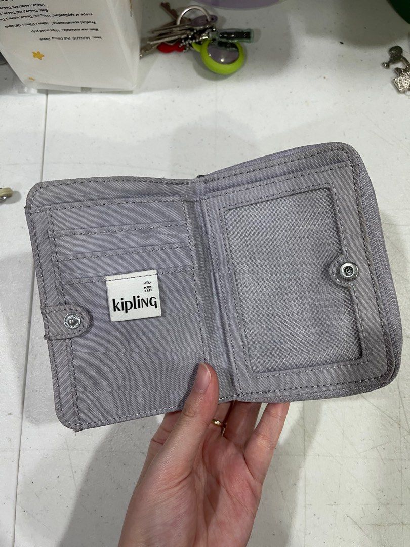 Kipling Short Wallet (Category: Wallets & Card holders) located in Manila. Submitted by AB_Merchandiseee (Listing ID 1386163226, Image 2). Description: RFS: Decluttering. Item in excellent condition, used only twice. Color may vary slightly due to lighting..