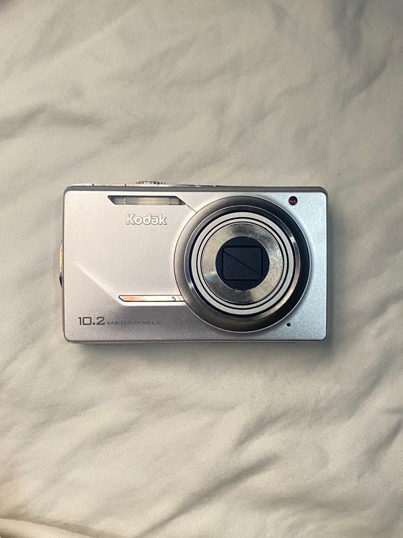 KODAK EASYSHARE M380 [READ DESCRIPTION] (Category: Cameras) located in Batangas. Submitted by wardrobebyazen (Listing ID 1386129811, Image 1). Description: KODAK EASYSHARE M380 📸💗‼️ * 10.2 megapixel * 9/10 cosmetic * ISSUE: LCD burn, lens error [needs repair] * Nagagamit pa siya last year, nastock lang kaya nasira * Quality photos! * INCLUSIONS: battery & charger cord only (usb to barrel male) no adaptor (pwede kahit ano basta usb port) * ₱1,00