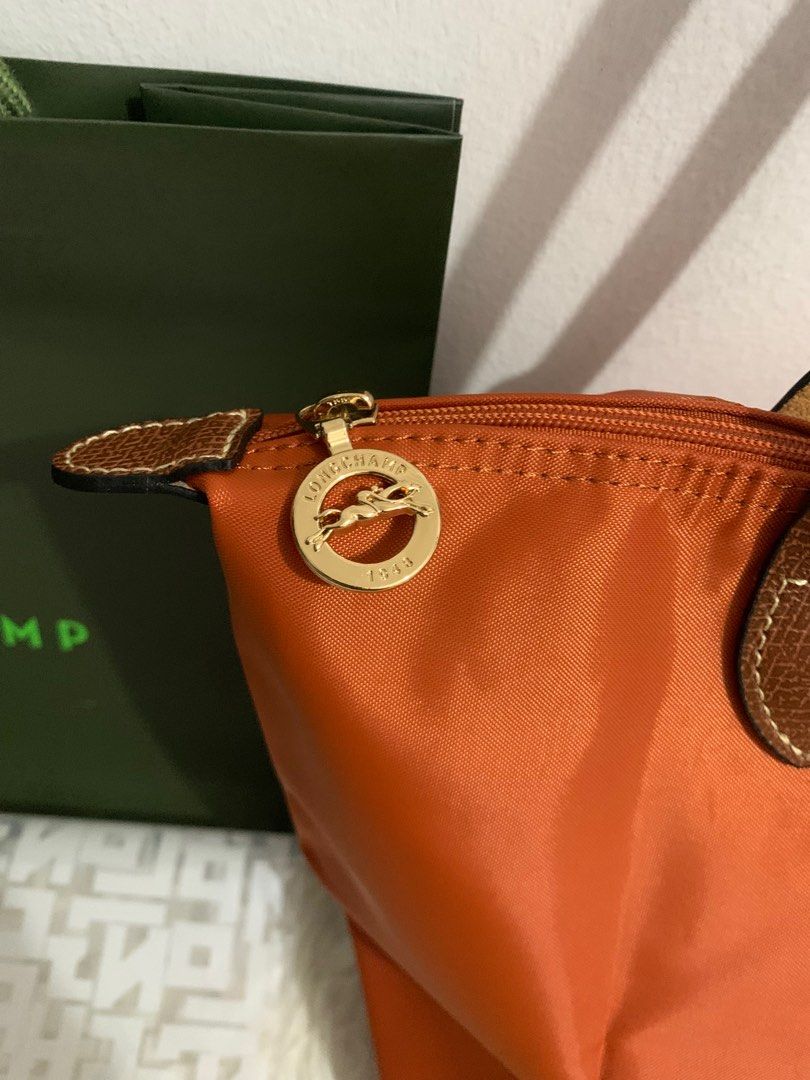 Longchamp Classic Medium (Category: Luxury Bags & Wallets) located in Manila. Submitted by jam.deals (Listing ID 1386172352, Image 2). Description: For Sale: Longchamp Le Pliage Classic Medium Tote (Brique CW) ✅ 100% Authentic ✅ Brand new ✅ Excellent condition – no issues Inclusions: • Longchamp dust bag • Paper bag • Protective plastic 💼 Price: ₱5,000 + SF For faster transactions, please contact me at: 0952 442 1386 (Limit reached here, I may n