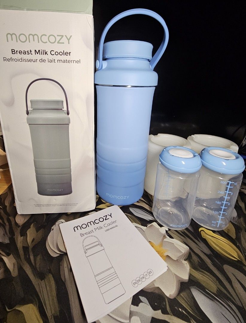 Momcozy cooler blue (Category: Breastfeeding & Bottle Feeding) located in Bulacan. Submitted by aneerazilem (Listing ID 1386192574, Image 3). Description: Brand new Never used inclusion: tumbler 2pcs ice tubes with box 2 storage bottles (used) Loc. Sjdm bulacan shipping thru jnt.