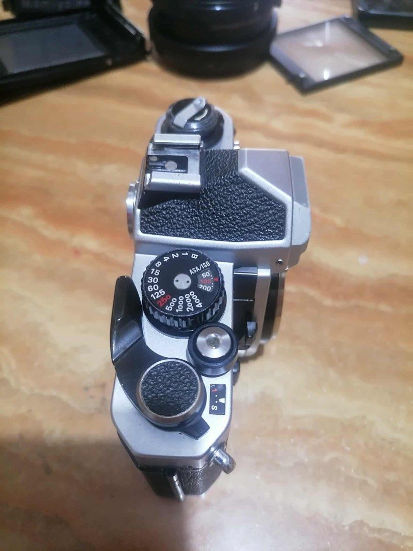 Nikon FM2 body (Category: Cameras) located in Manila. Submitted by dominicju40682 (Listing ID 1386160433, Image 3). Description: Nikon FM2 body in good condition Functions 9/10 Cosmetics 9/10 Recently CLAd by Sir Mike Coloma Touch up paint done, some scratches on the chrome body esp at the bottom plate. No corrosion on the battery compartment Shutter working, shutter speeds from bulb to 1/4000s working Light meter needs repair, LED light working,