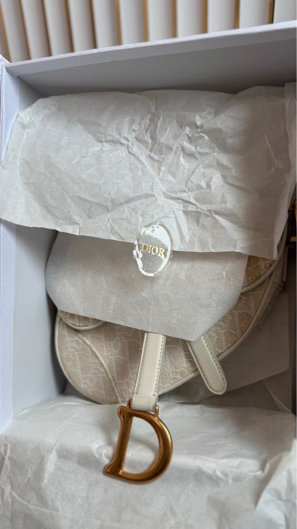 Oblique Dior Mini Saddle Bag White (Category: Luxury Bags & Wallets) located in Manila. Submitted by christinel52927 (Listing ID 1386045142, Image 3). Description: Complete with dustbag, box and entrupy for authentication.