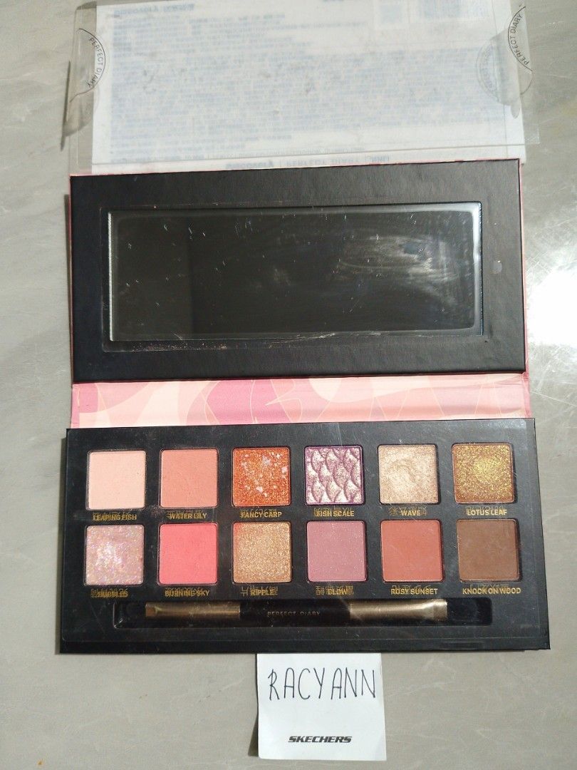 Perfect Diary 12 pans eyeshadow palette w/brush (Category: Makeup) located in Rizal. Submitted by reyshishibal (Listing ID 1386162102, Image 1). Description: In a very good condition, hindi dirty and intact pa ang film ng mirror - used only on my graduation pictorial and graduation - can send video condi - authentic official, scan the barcode to check authenticity - est sf if jnt: around 50 only SWATCHED ONLY SHADES: - fancy carp -fish scale - lo