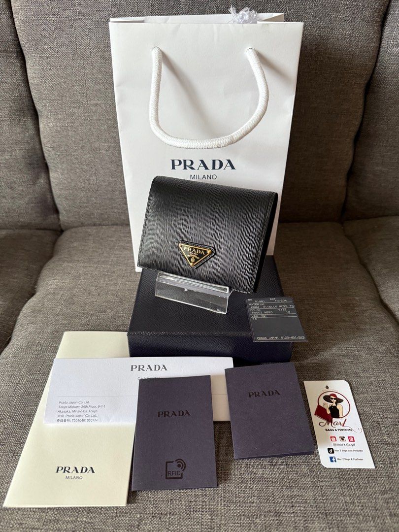 Prada bifold wallet (Category: Luxury Bags & Wallets) located in Tagaytay City. Submitted by marz.shopping (Listing ID 1386196016, Image 1). Description: Complete inclusion.