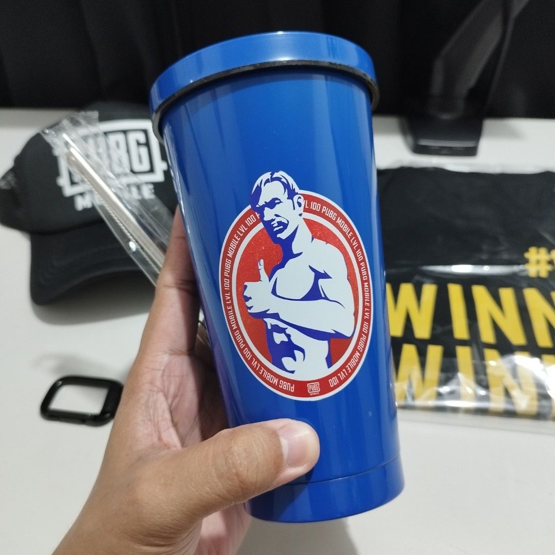 PUBG Mobile Official Merch "Airdrop Carnival" (Category: Caps & Hats) located in Marikina City. Submitted by unfadingph (Listing ID 1386143558, Image 2). Description: Selling this PUBG Mobile complete official merch for P1,500 only. Presyong pang stainless tumbler n lng with metal straw & straw cleaner. Sold as set: - Stainless Tumbler with metal straw & cleaner. - Statement T-Shirt - 22" x 28.5" (WxH) - PUBG Trucker Cap.🔥 - Key Holder Chain. Fe