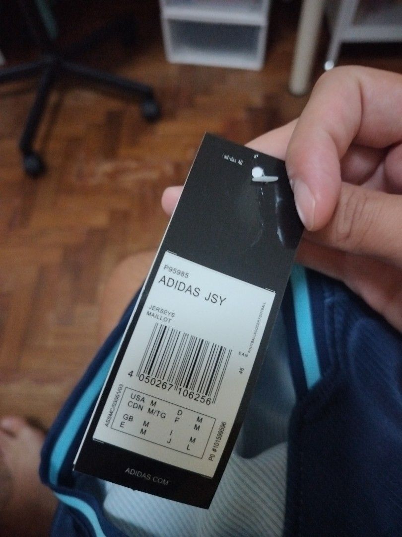 Real Madrid jersey (Category: Activewear) located in Singapore. Submitted by miwa. (Listing ID 1386170327, Image 3). Description: BNWT tracked postage with bubble mailer is $2 postage fee waived with minimum purchase of $30.