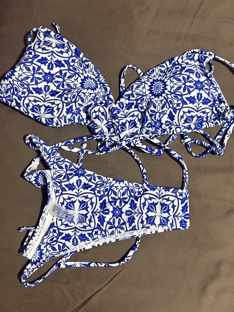 Shein - Bikini Set (Category: Bikinis & Swimsuits) located in Marikina City. Submitted by declutteringfatty (Listing ID 1386036581, Image 1). Description: Brand: Shein Color: Blue with prints Size: S on tag (fits S-M) RFS: Its brand new but was too big on me. Cannot return as per Shein’s policy. NEVER WORN. *Selling it as the same price I bought it.