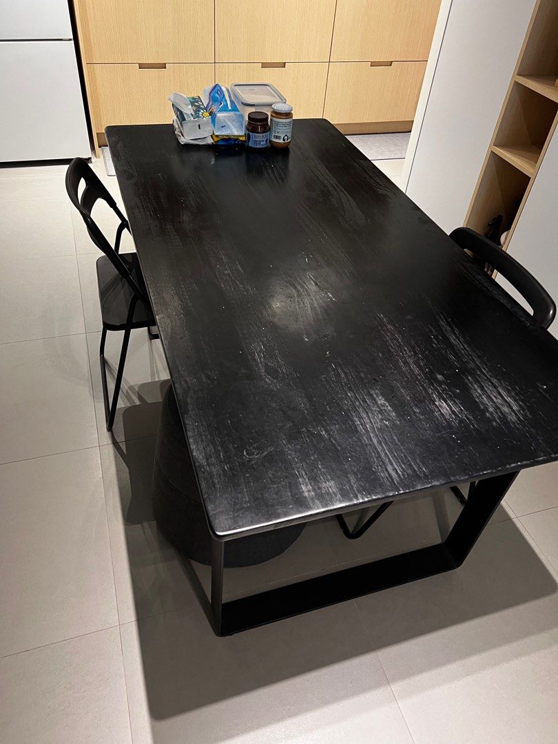 Timbre Dining Table (Category: Tables & Sets) located in Singapore. Submitted by lilijiexinku.grain (Listing ID 1386038154, Image 2). Description: Black wooden surfaces top Black metal leg stand Stable and solid material.