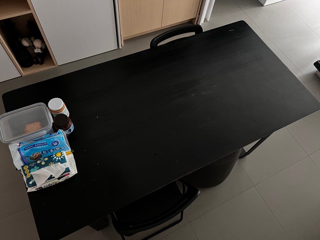 Timbre Dining Table (Category: Tables & Sets) located in Singapore. Submitted by lilijiexinku.grain (Listing ID 1386038154, Image 1). Description: Black wooden surfaces top Black metal leg stand Stable and solid material.