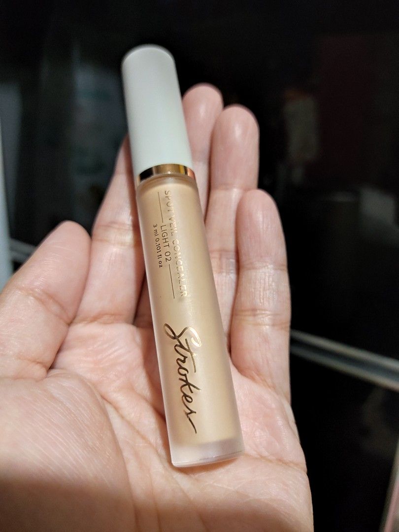 Authentic Strokes Spot Veil Concealer (Category: Makeup) located in Manila. Submitted by bb_mushroom (Listing ID 1386379289, Image 2). Description: Authentic Strokes Spot Veil Concealer ( Oil-Free Matte Liquid Concealer ) Php 150 - brand: Strokes Beauty Lab - shade: light 02 - used like 40% only - no box - good condition - lightweight - medium to full coverage with matte finish - effectively conceals blemishes and uneven skin tones RFS: Declutter