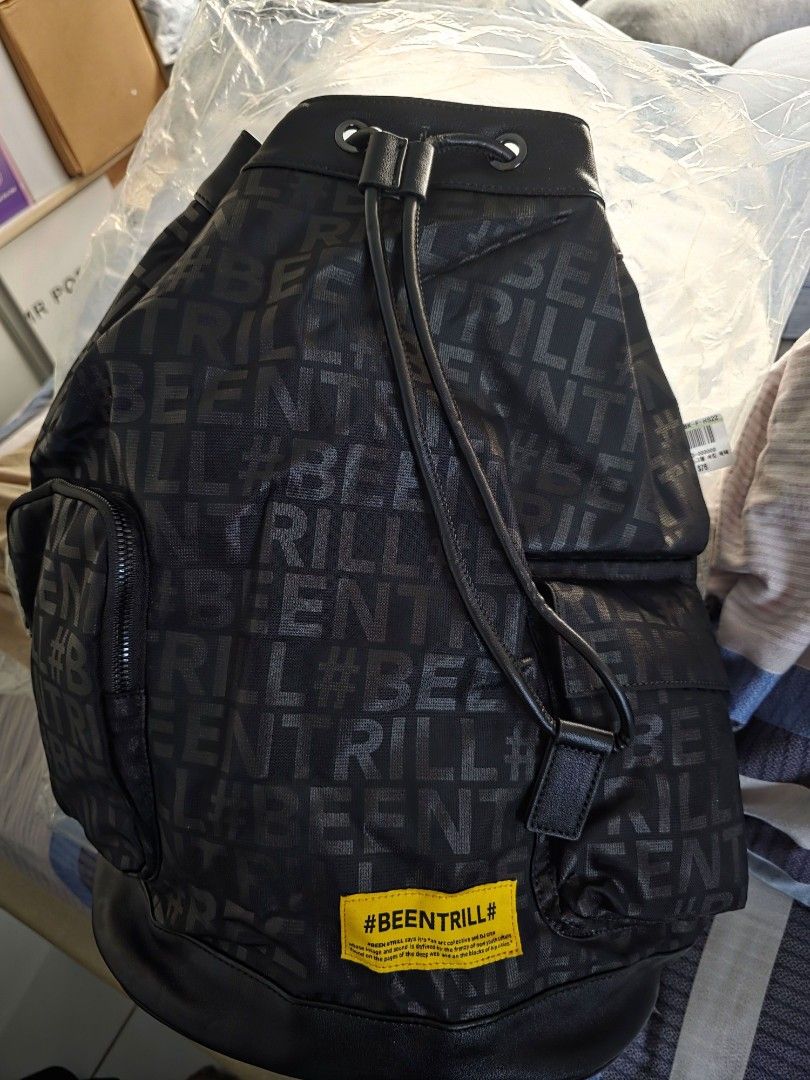 Beentrill Drawstring Backpack (Category: Backpacks) located in Singapore. Submitted by fatteebb (Listing ID 1386287830, Image 1). Description: 100% authentic Brand new with tag Original $128+ Good for gifting Comes with 2 front pocket as well Free delivery to your doorstep Size: 40cm by 42cm, base about 20cm.