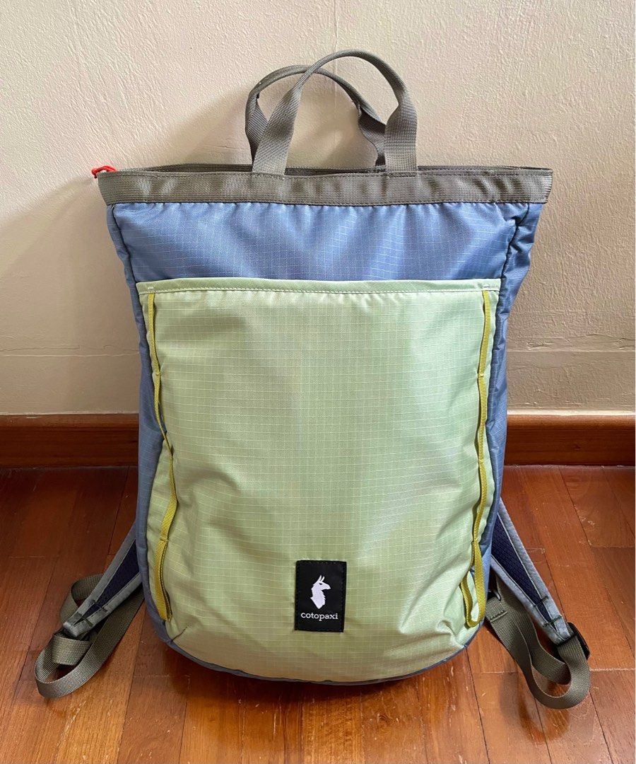 Cotopaxi Todo 16L Convertible Tote - Cada Dia (Category: Backpacks) located in Singapore. Submitted by csthg (Listing ID 1386245585, Image 1). Description: - Cotopaxi Todo 16L Convertible Tote in excellent condition. - Eye-catching blue and green color scheme. - Convenient top handle. - Adjustable shoulder straps for a comfortable fit. Straps can be stowed away when used as a tote. - Suitable for everyday use and travel. - Meet up only to transac