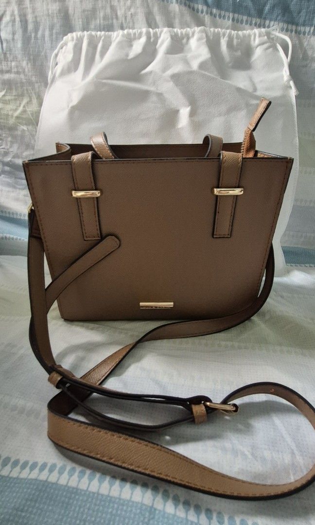 Eve and Adam Dara Mini Sling Bag (Category: Cross-body Bags) located in Quezon City. Submitted by averyav (Listing ID 1386241749, Image 3). Description: Eve and Adam Dara Mini Sling Bag in Mocha Color Personally purchased online in Feb 2025 Excellent condition, used only a few times Comes with original dustbag and care cards RFS: too small for my things.