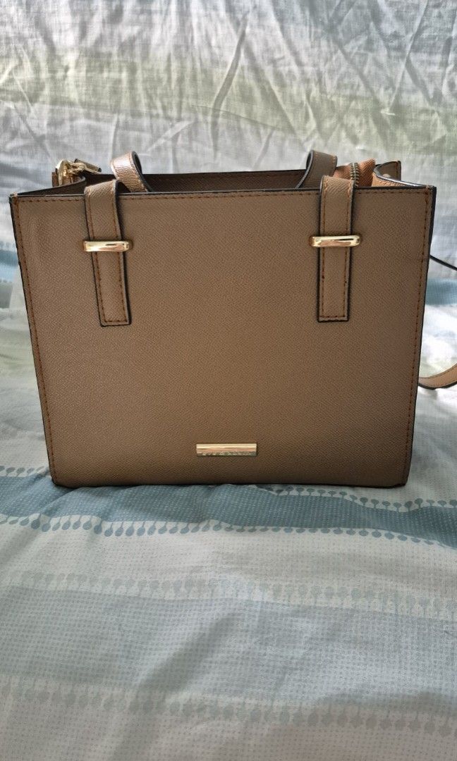 Eve and Adam Dara Mini Sling Bag (Category: Cross-body Bags) located in Quezon City. Submitted by averyav (Listing ID 1386241749, Image 2). Description: Eve and Adam Dara Mini Sling Bag in Mocha Color Personally purchased online in Feb 2025 Excellent condition, used only a few times Comes with original dustbag and care cards RFS: too small for my things.