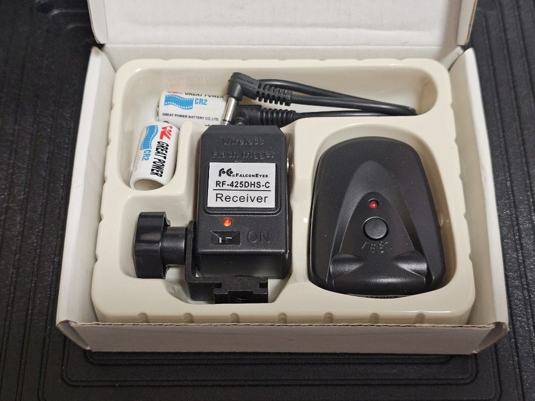 FalconEyes RF-425DHS-C wireless flash trigger system receiver unit (Category: Other Photography Accessories) located in Manila. Submitted by greycrane (Listing ID 1386311829, Image 2). Description: FalconEyes RF-425DHS-C wireless flash trigger system receiver unit Includes transmitter, receiver unit, cable, and a pair of CR2 batteries. Comes with extra PT-04 receiver. Rarely used and kept in a dry cabinet. Not sure about the capacity of the CR2 b