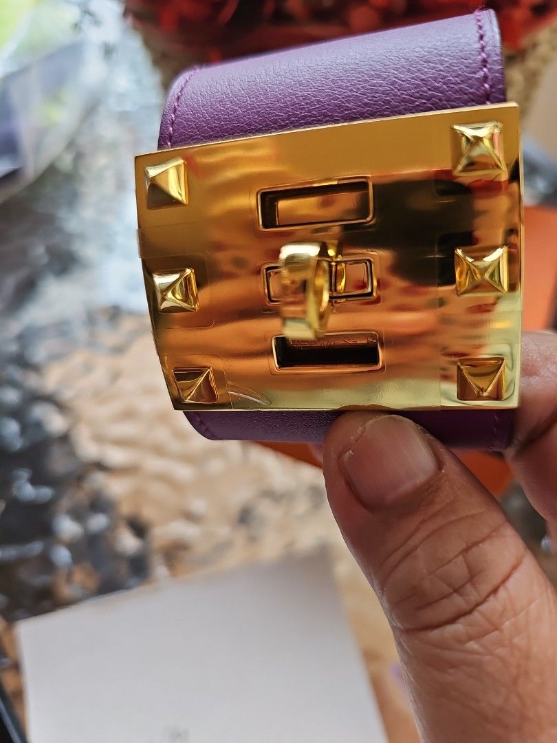 Hermes Kelly dog cuff purple (Category: Luxury Accessories) located in Paranaque City. Submitted by cruisefufi (Listing ID 1386275820, Image 2). Description: Authentic new kelly dog cuff purple (size S small)in Palladium hardware with box and dustbag size: 5cm arm circumference 16-19 cm adjusts up to 3 locks.